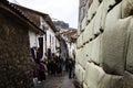 Pedestrians Shopping And Inca Stone Work Wall Cusco Peru