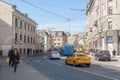 Pedestrians, taxi, trolleybus and cars in Moscow