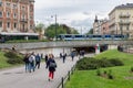 Pedestrians through an underpass downtown Krakow city