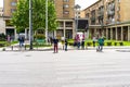 Pedestrians waiting to cross the street in Bucharest, Romania, 2020