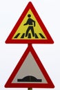 Pedestrians walking along the road with bum sign, yellow and red board with white background Royalty Free Stock Photo