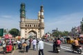 Pedestrians walking at Charminar street of Hyderabad with background of Charminar, which is a monument and mosque