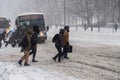 Pedestrians walking in Downtown Montreal during snow storm