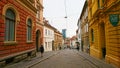 pedestrians walking on medieval-style downtown Zagreb street before the pandemic