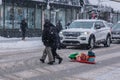 Pedestrians walking on Mont-Royal Avenue during snow storm Royalty Free Stock Photo