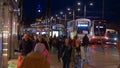 Pedestrians walking at Princes Street Edinburgh at night - EDINBURGH, SCOTLAND - JANUARY 10, 2020