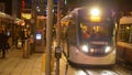 Pedestrians walking at Princes Street Edinburgh at night - EDINBURGH, SCOTLAND - JANUARY 10, 2020