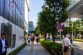 Tokyo, Japan, 26 October 2023: Pedestrians walking on a sidewalk in Tokyo\'s business district