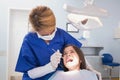 Pediatric dentist examining her young patient Royalty Free Stock Photo