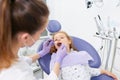 Pediatric dentist with patient