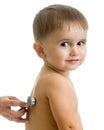 Pediatric doctor examining kid with stethoscope isolated on whit Royalty Free Stock Photo