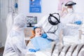Pediatric stomatolog doing oral hygine procedure