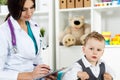 Pediatrician communicating with patient Royalty Free Stock Photo