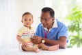 Doctor examining baby. Pediatrician with patient Royalty Free Stock Photo