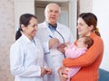 Pediatrician doctors examining little baby Royalty Free Stock Photo