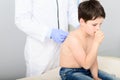 Pediatrician doing checkup on young boy Royalty Free Stock Photo