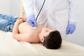 Pediatrician doing checkup on young boy Royalty Free Stock Photo