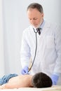 Pediatrician doing checkup on young boy Royalty Free Stock Photo