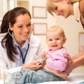 Pediatrician examine baby with stethoscope