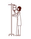 Pediatrician female doctor with liquid bag hanging