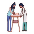 Pediatrician female doctor with mom and baby in changer