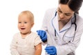 Pediatrician in gloves standing near cheerful