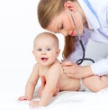 Pediatrician listening baby heart Royalty Free Stock Photo