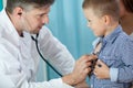 Pediatrician listening preschooler heart Royalty Free Stock Photo