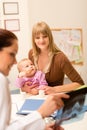 At the pediatrician office mother with baby Royalty Free Stock Photo