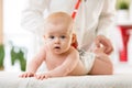 Pediatrician taking care of baby. Little boy is being examine by doctor with stethoscope in hospital. Health care and medicine con Royalty Free Stock Photo