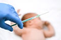 Pediatrician vaccinating newborn baby. Vaccine, Vaccination for infant child Soft focus Syringe in hands of a nurse and blurred Royalty Free Stock Photo