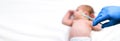 Pediatrician vaccinating newborn baby. Vaccine, Vaccination for infant child Soft focus Syringe in hands of a nurse and blurred Royalty Free Stock Photo