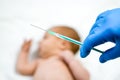 Pediatrician vaccinating newborn baby. Vaccine, Vaccination for infant child Soft focus Syringe in hands of a nurse and blurred Royalty Free Stock Photo