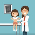 Pediatrician woman doctor examining a little girl