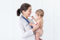 Pediatrics, a doctor examines a baby boy, the concept of medicine and health