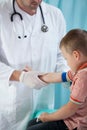 Pediatrist make an injection
