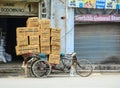 A pedicab carrying goods on street in Amritsar, India