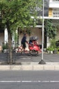 Pedicab drivers carrying passengers