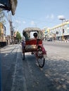 pedicab drivers waiting for customers on the side of the road Royalty Free Stock Photo