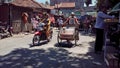 Pedicab from Hokkien: be chia `horse-drawn carriage` is a three-wheeled transportation mode that is commonly found in Indonesia
