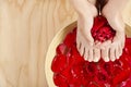 Pedicure Manicure Spa Treatment with Red Roses Wood Background Royalty Free Stock Photo