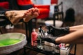 Pedicurist doing feet massage after pedicure bath