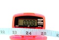 Pedometer with tape measure Royalty Free Stock Photo