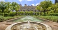 Pedro Luis Alonso gardens and the Town Hall building in Malaga, Royalty Free Stock Photo