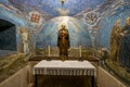 A mosaic in a small chapel with figures of saints and angels in the convent of El Palancar. The smallest in world