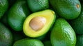 A Peek Inside: Exposing the Luscious Heart of a Bunch of Green Avocados in Astonishing  Perspect Royalty Free Stock Photo