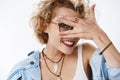 Peekaboo who there. Portrait of charismatic cute and playful girlfriend with stylish curly hairstyle wearing glasses and Royalty Free Stock Photo