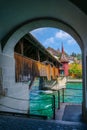 Peeking through a portal to view the Mill Bridge of Lake Lucerne