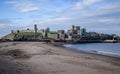 Peel Castle as seen from the beach at the entrance to Peel harbour, Isle of Man Royalty Free Stock Photo