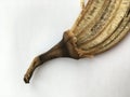 The peel of a ripe banana with a tail. Minimalistic wallpaper.